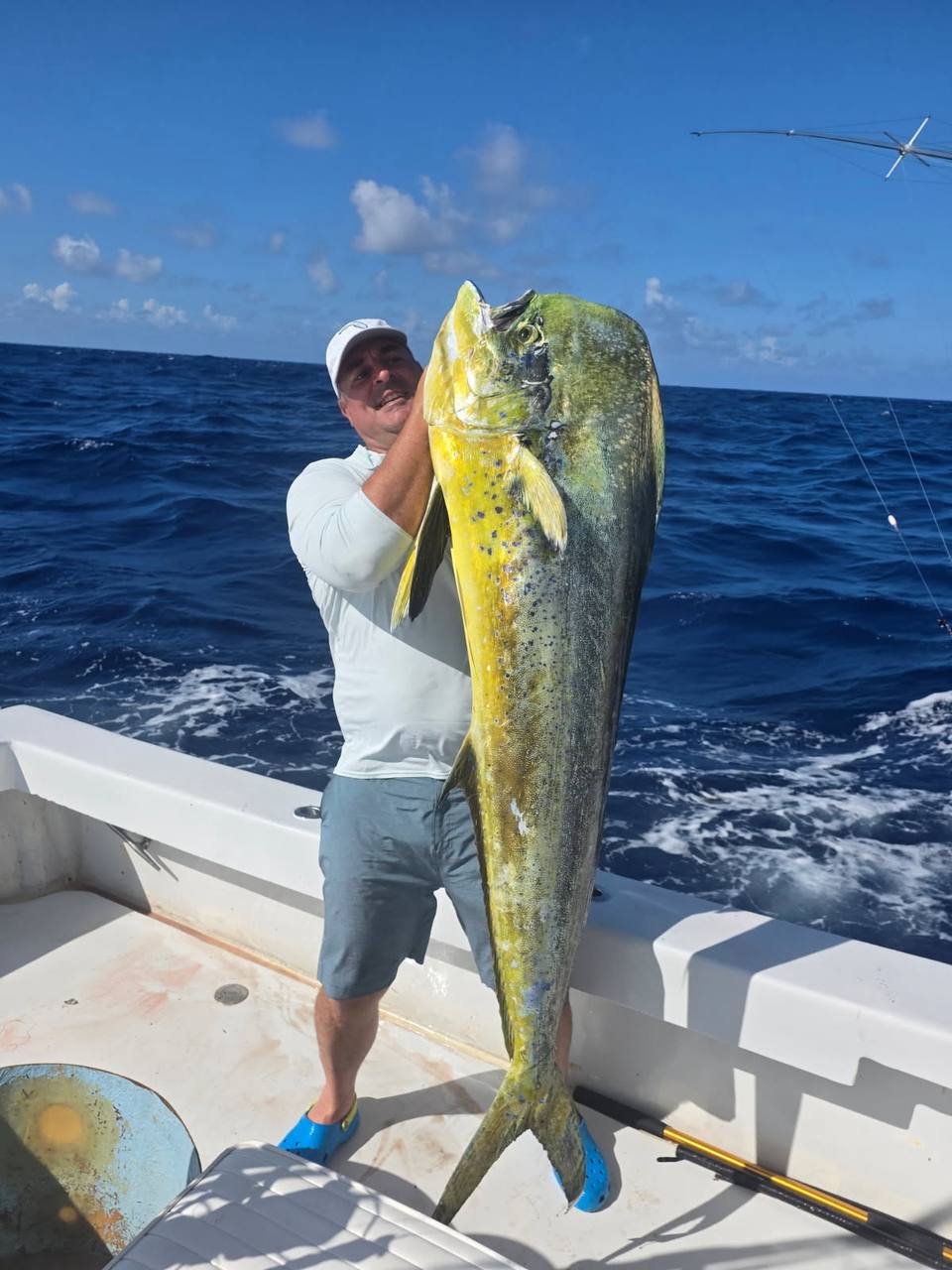 Ron Hodges with a 65-inch bull mahi caught aboard the Caribsea with Captain Kenny Spaulding